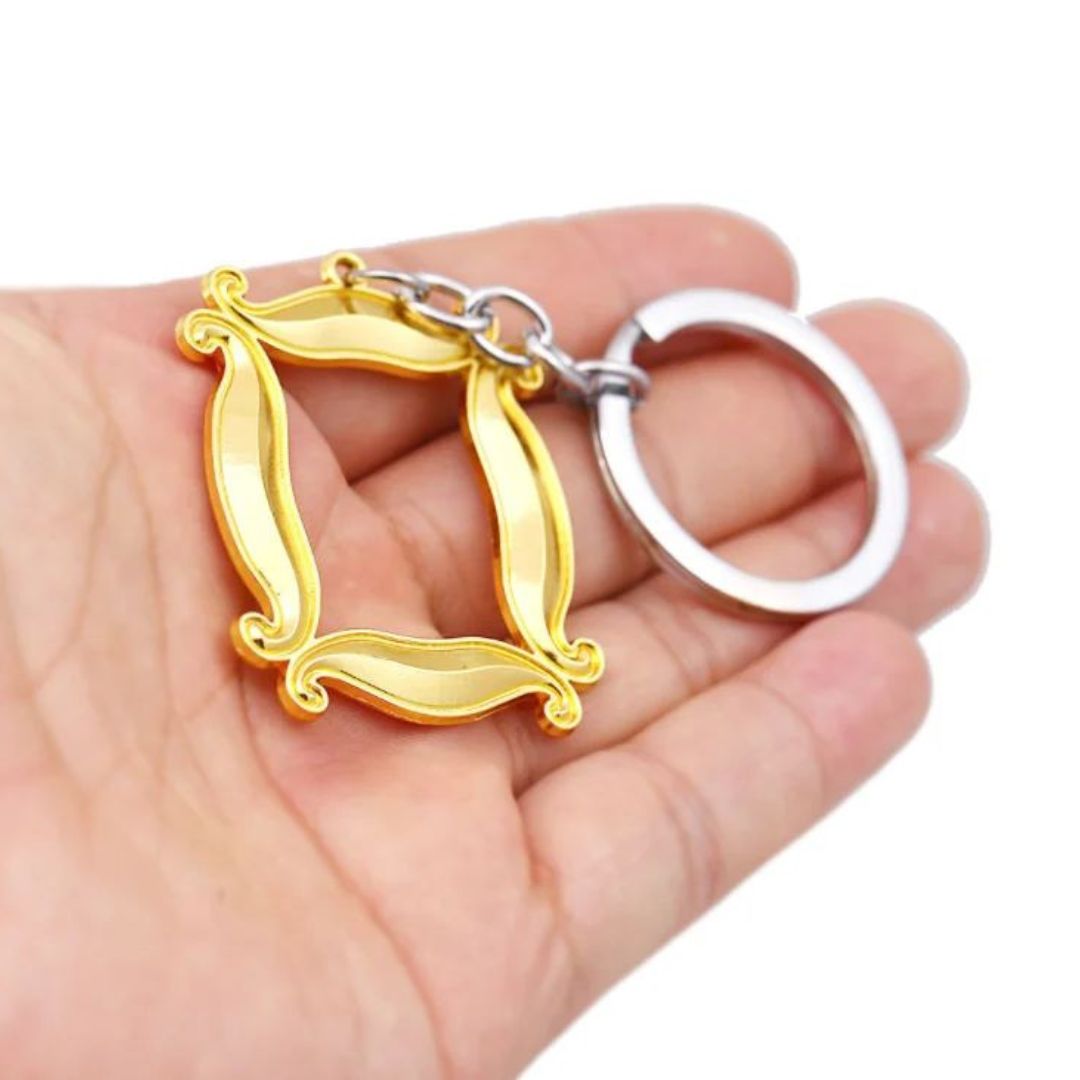 F.R.I.E.N.D.S - Door Frame Keychain Held in a Hand - Tinyminymo