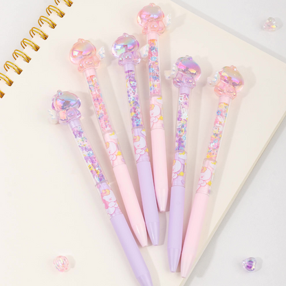 Both Variants of Glitter Unicorn Pen with Glittery Accents on a Notebook - Tinyminymo