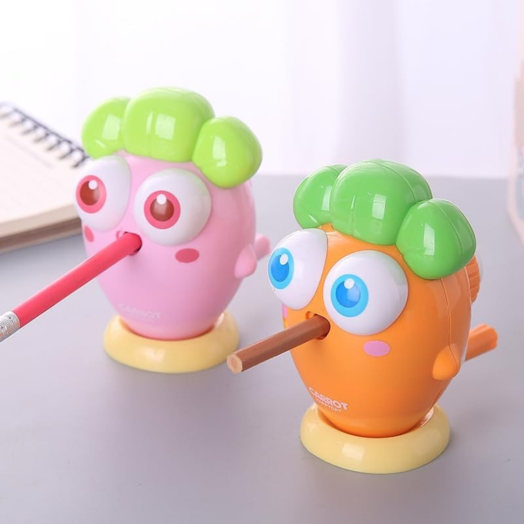 Two Colors of Happy Carrot Mechanical Sharpener Holding a Pencil - Tinyminymo 