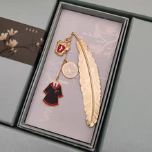 Load image into Gallery viewer, Harry Potter Bookmark, Gryffindor with a Gold Feather Design - Tinyminymo
