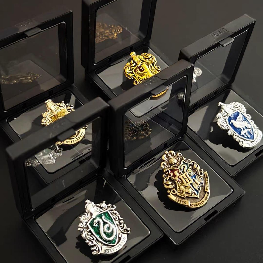 Collection of Harry Potter Hogwarts Crest Lapel Pin in Black Display cases - Tinyminymo
