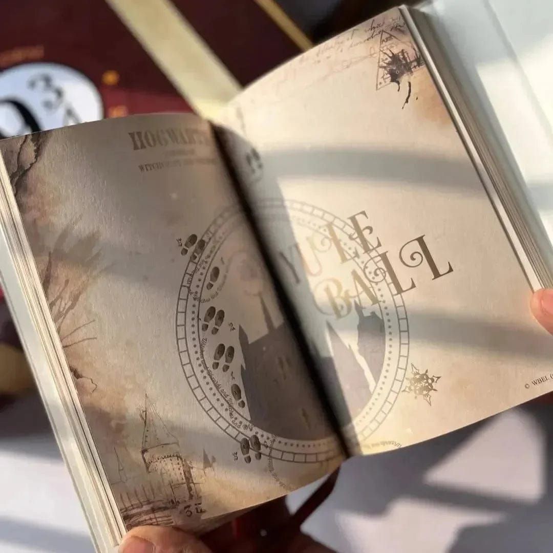 Hand holding an open Harry Potter Planner – Tinyminymo