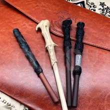 Load image into Gallery viewer, Four Harry Potter Wand Pen on a Brown Leather Surface - Tinyminymo
