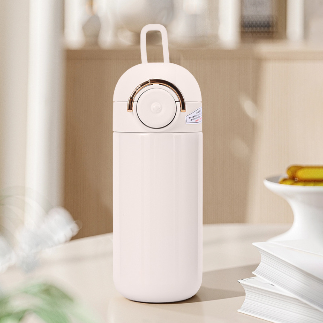 Off-White Insulated Metallic Travel Bottle on the table - Tinyminymo 