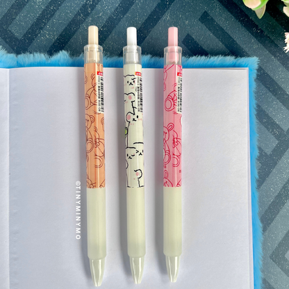 Three Kawaii Animal Gel Pens with Decorative Designs Placed on a Notebook Page – Tinyminymo