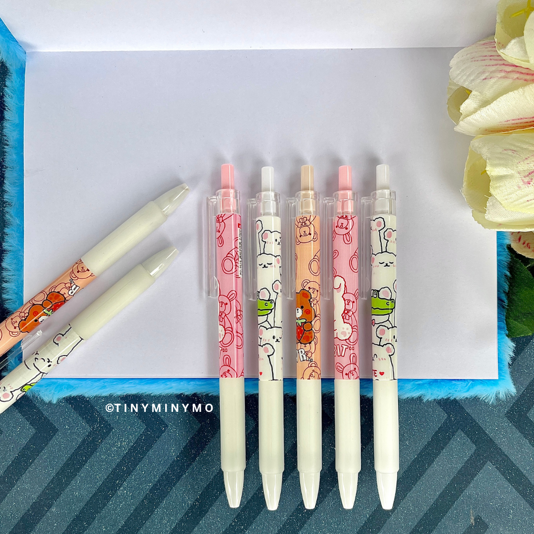 Seven Kawaii Animal Gel Pens Placed on a Blank Page Diary – Tinyminymo