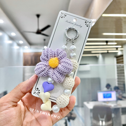 Hand Holding a Kawaii Mobile Charm with a Purple Flower - Tinyminymo