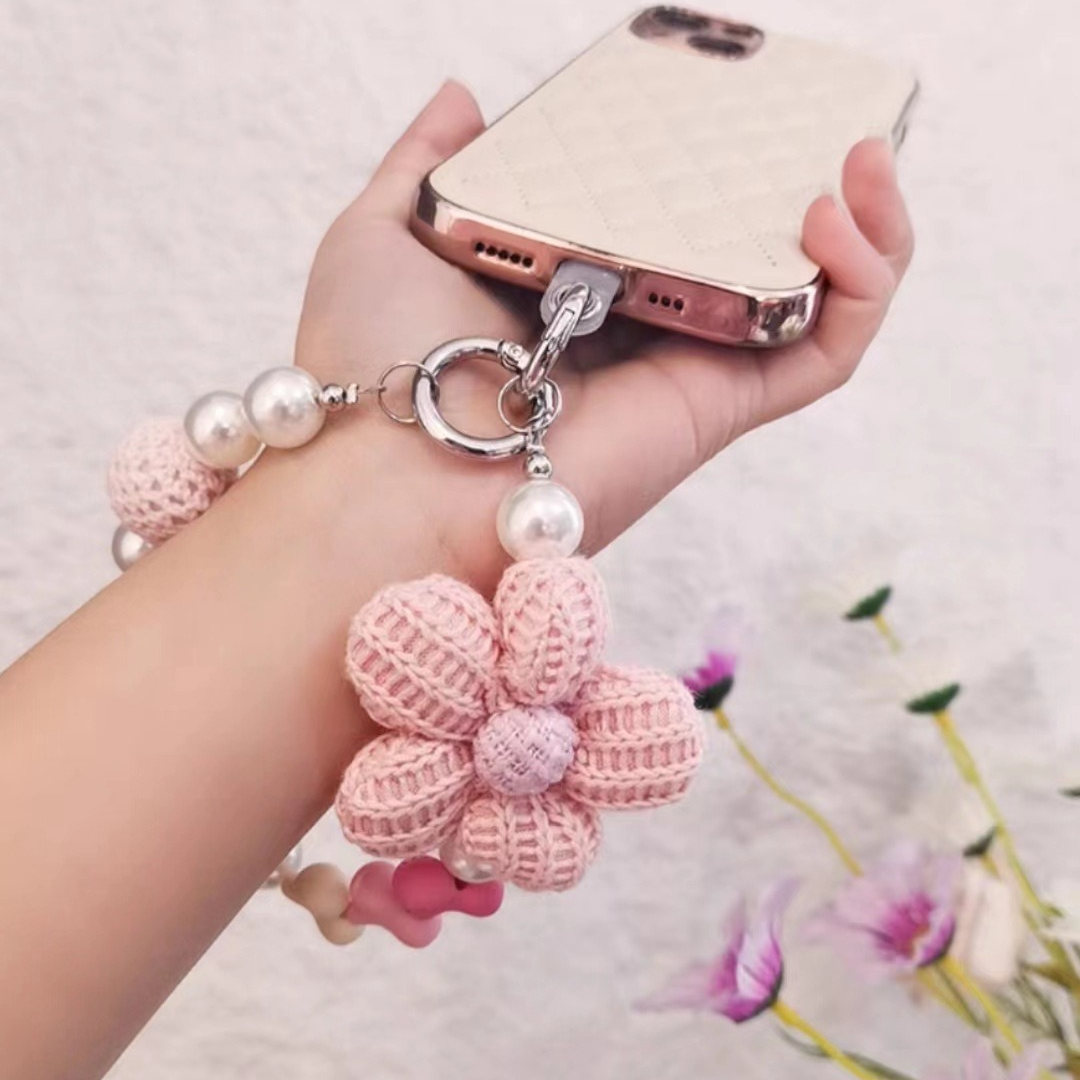 Hand Holding a Phone with a Pink Kawaii Mobile Charm and Pearl Beads - Tinyminymo