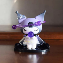 Load image into Gallery viewer, Kuromi Action Figure with Purple Accents and Black Stand on a Wooden Surface - Tinyminymo
