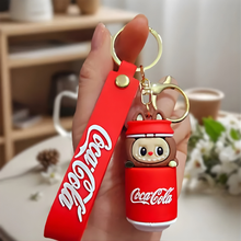 Load image into Gallery viewer, Labubu in a Coca-Cola Can Keychain Design held by a Hand - Tinyminymo
