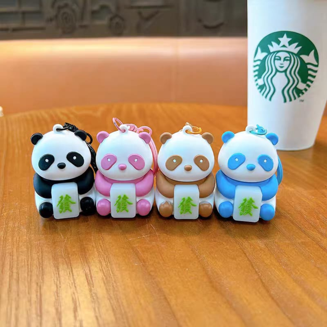 Four Different Color Panda Keychains Sitting on the Table - Tinyminymo