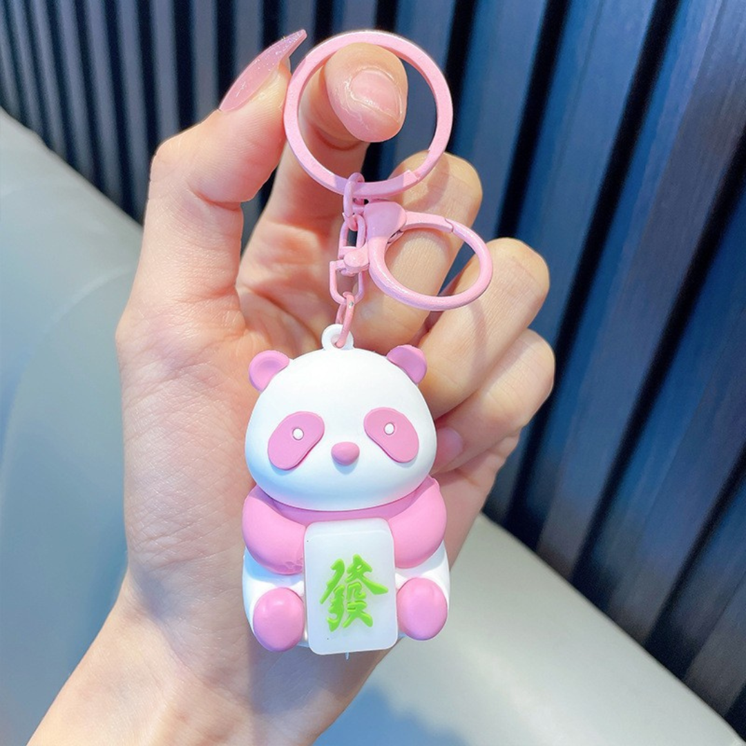 Pink Lightup Panda Keychain Held in a Hand - Tinyminymo 