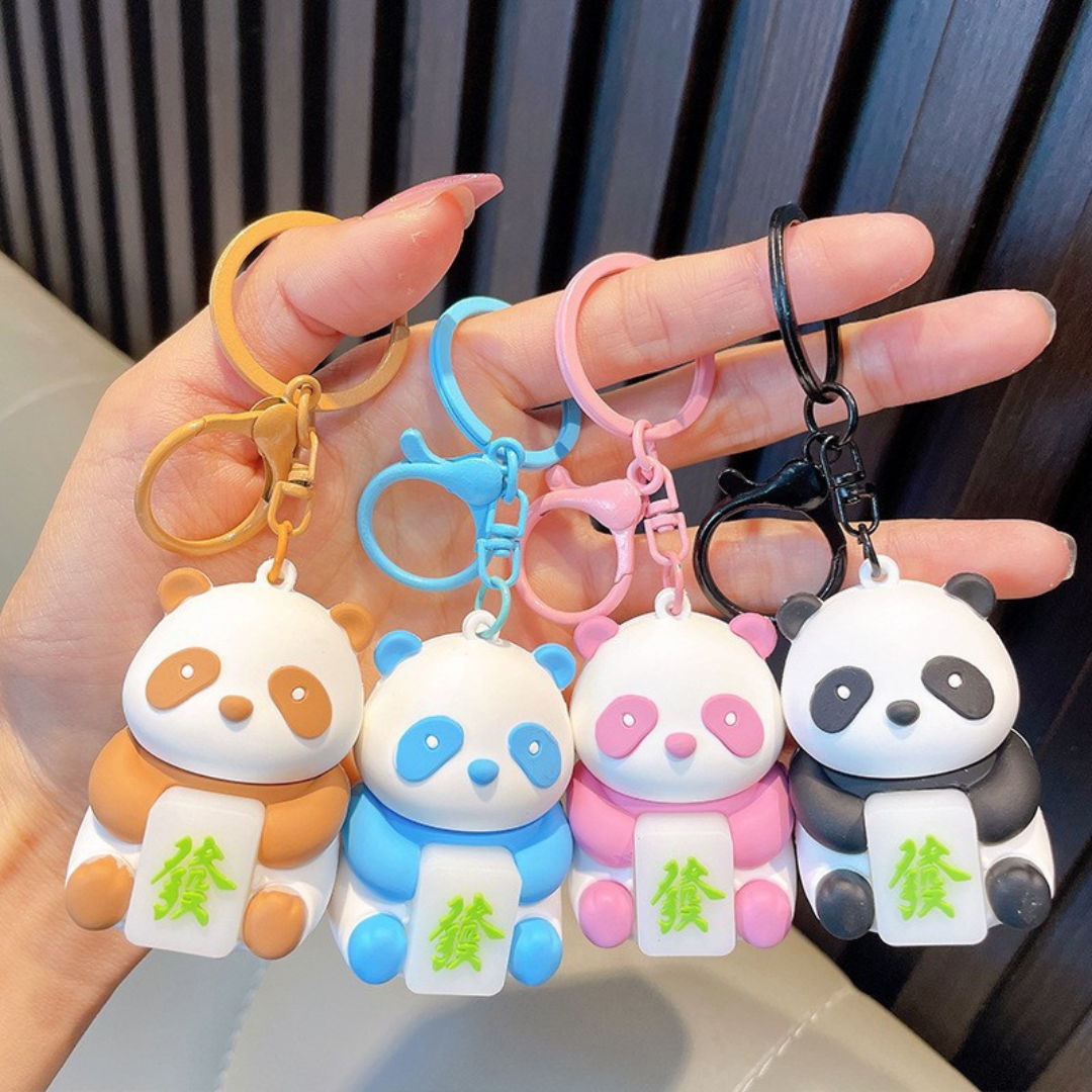 Four Colorful Panda Keychains in one Hand - Tinyminymo
