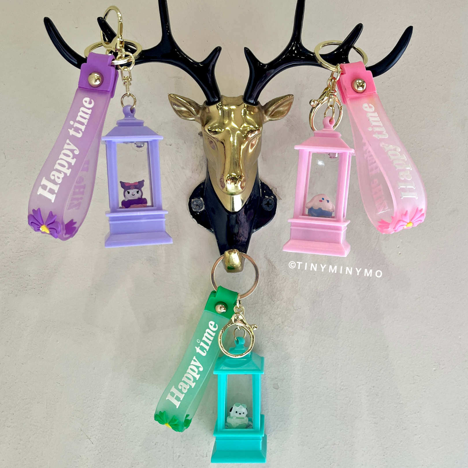 Lightup Sanrio Keychains Hanging From a Deer Head Mount - Tinyminymo