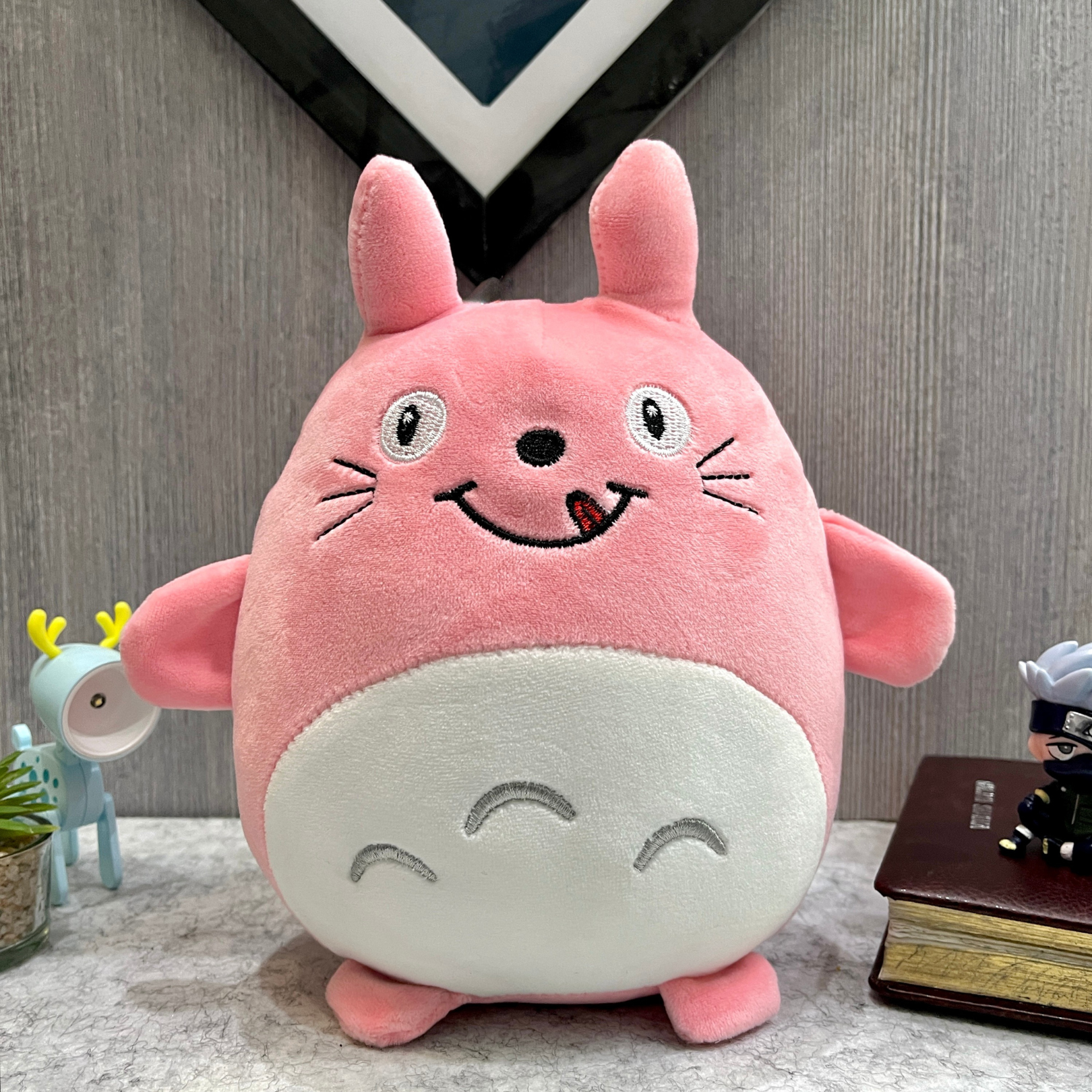 Pink plush Totoro Soft Toy with a happy expression on a surface with a neutral background - Tinyminymo