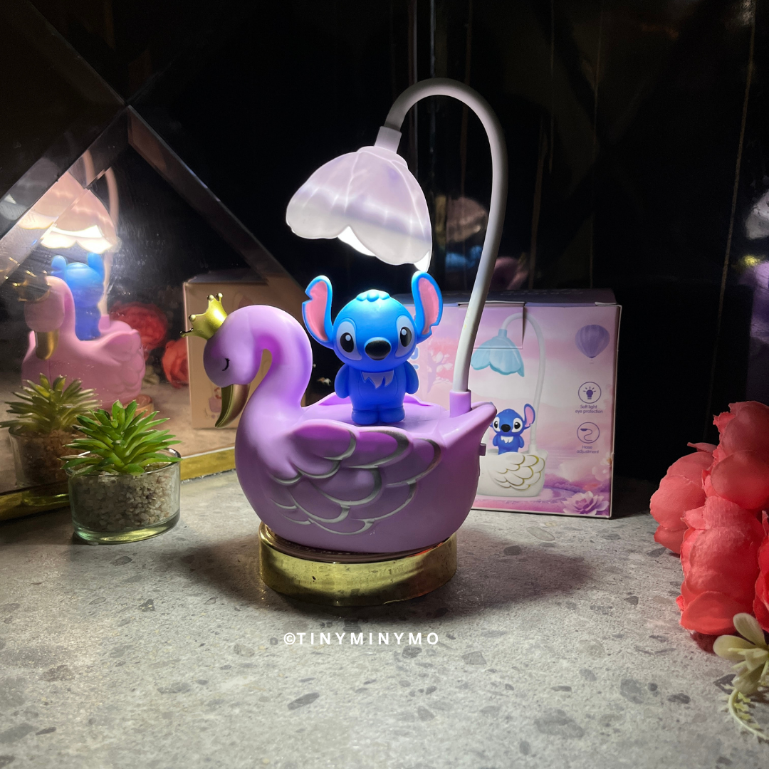 Stitch Character on a Purple Multifunctional Duck LED Desk Lamp with a Dark Background - Tinyminymo