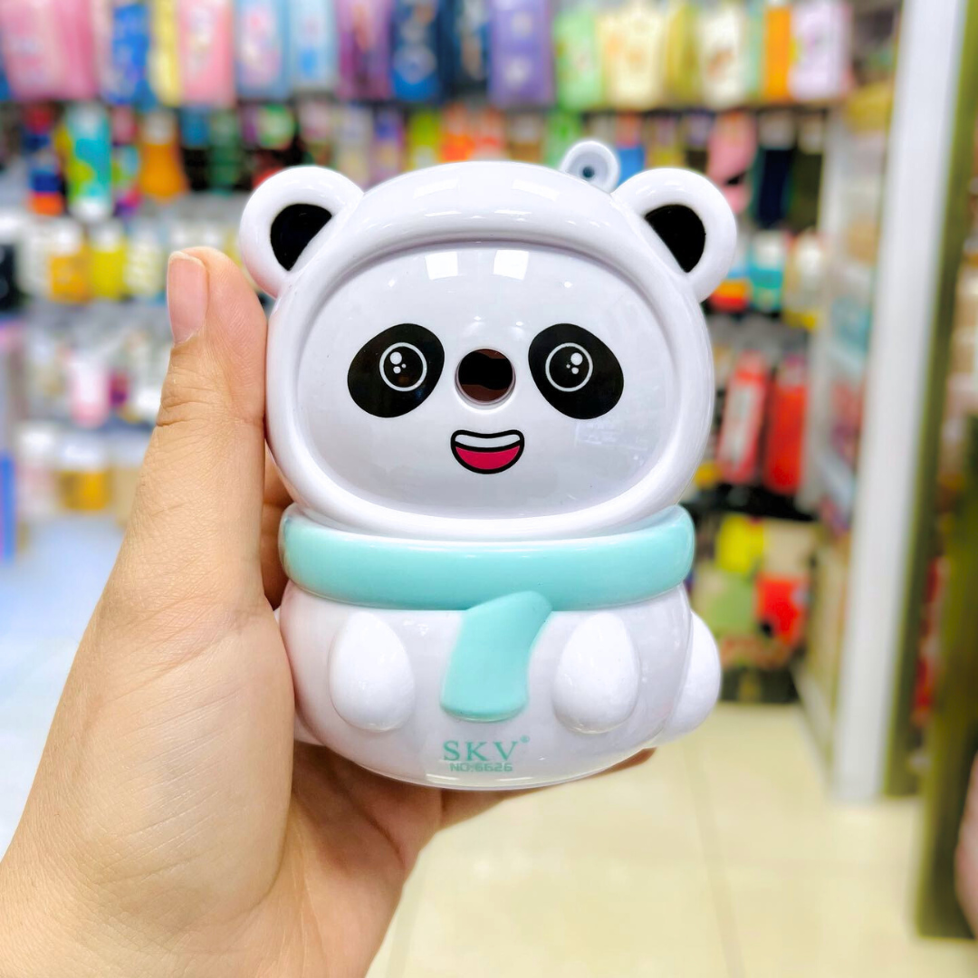 Hand holding a Panda Mechanical Sharpener in a store setting - Tinyminymo