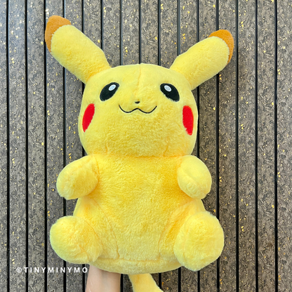 Pikachu Soft Toy on a wooden background - Tinyminymo