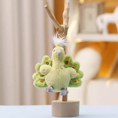 Green Plush Peacock Keychain Hanging  on a Wooden Stand - Tinyminymo