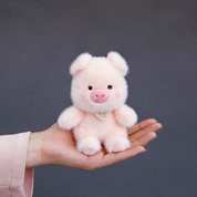 Plush Piggy 3D Keychain in Pink Color Held in a Hand Against a Dark Background - Tinyminymo