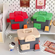 Portable Store Shaped Piggy Bank in Red, Green and Beige on a Shelf with a Pegboard Background - Tinyminymo