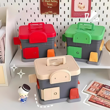 Load image into Gallery viewer, Portable Store Shaped Piggy Bank in Red, Green and Beige on a Shelf with a Pegboard Background - Tinyminymo
