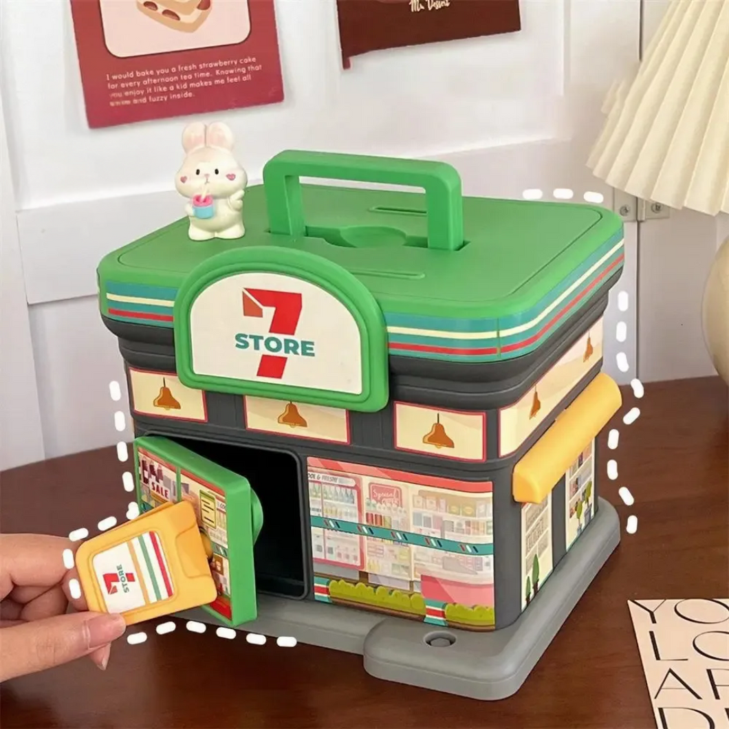 Portable Store Shaped Piggy Bank in 7 Store Variant, held by the Key - Tinyminymo
