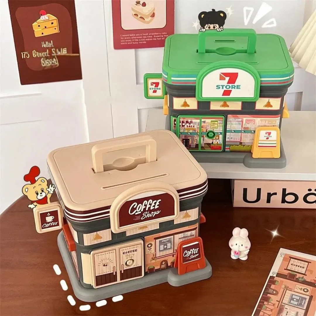 Two Portable Store Shaped Piggy Banks, one resembling a Coffee shop and the other a Store, kept on a wooden surface - Tinyminymo 