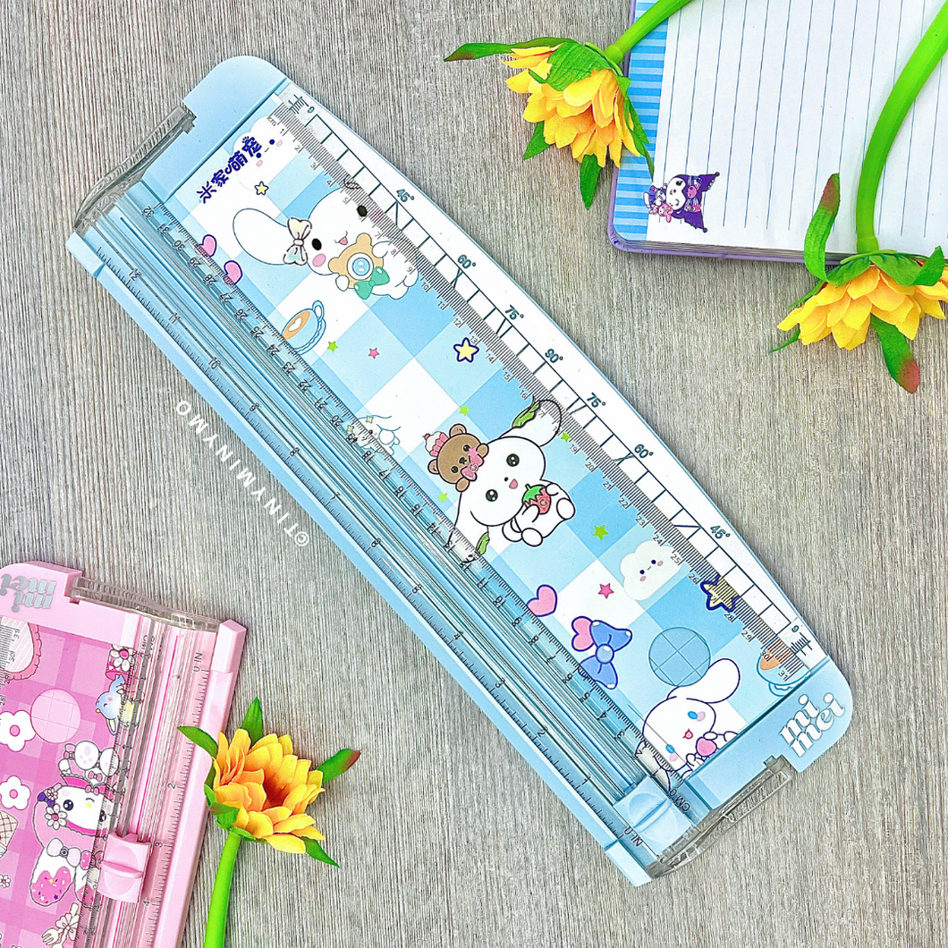 Sanrio Paper Trimmer - Cinnamoroll with Decorative Elements on a Wooden Surface - Tinyminymo