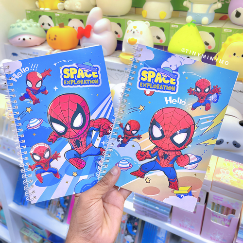Two Spiderman Notebook held in Hand in front of a store shelf - Tinyminymo