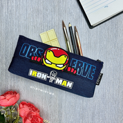 Superhero Pencil Pouch Featuring Iron Man Design, Placed on a Grey Surface with Stationery Items and a Flowers - Tinyminymo